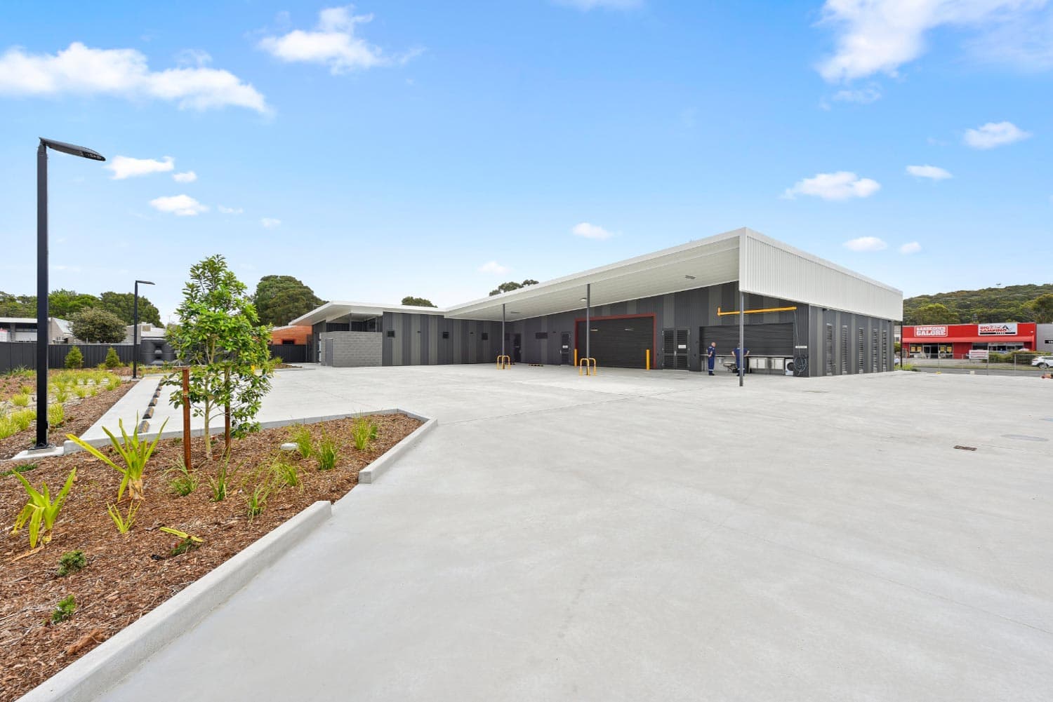 NSW Ambulance Station, completed facility with ambulance hardstand, landscaping and access driveway