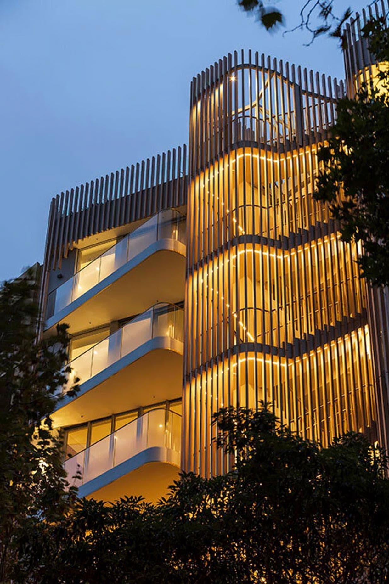 Calibre Cooper Street, illuminated facade at dusk, Cooper Street