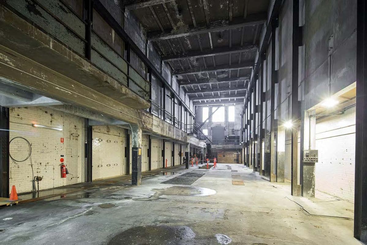 The Machine Hall interior prior to renovation, a raw industrial space of exceptional scale