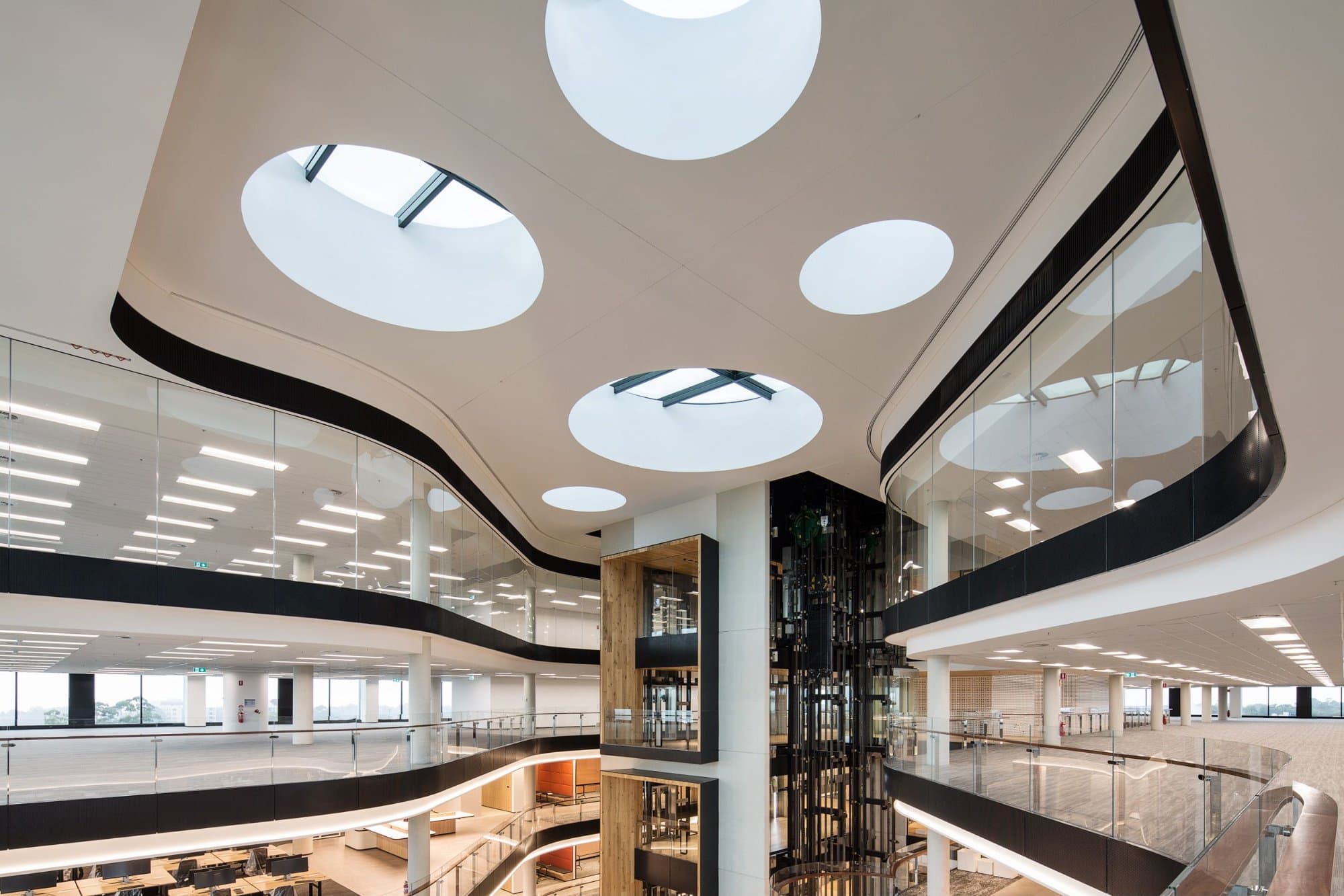 The Glasshouse, central atrium with circular skylights and multi-level open floors
