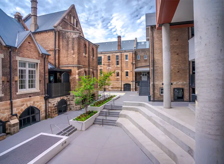 Inner Sydney High School, restored heritage courtyard with sandstone and brick buildings