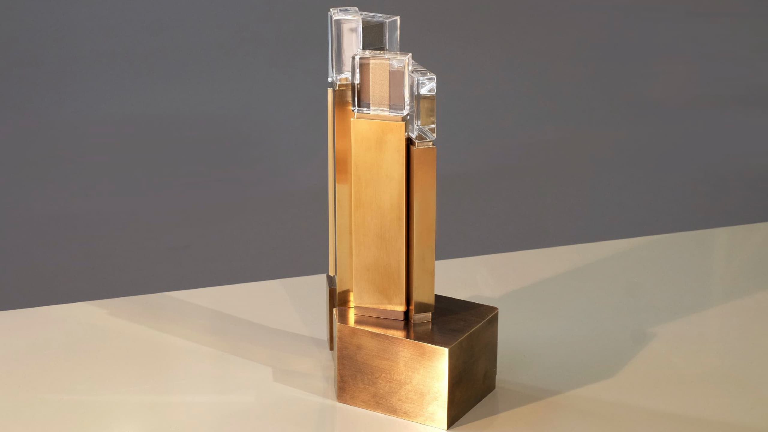 FJMT competition entry, physical model showing the tower form in brass and glass