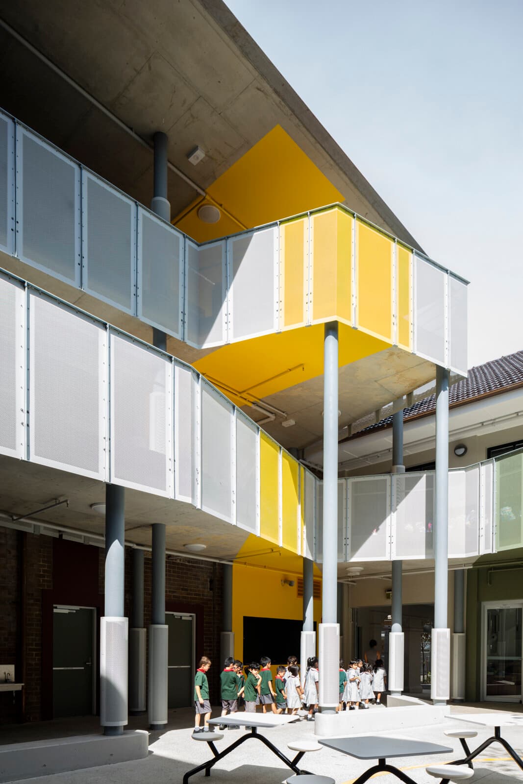 O'Connell Street Public School, external circulation and courtyard stair with yellow accent screens