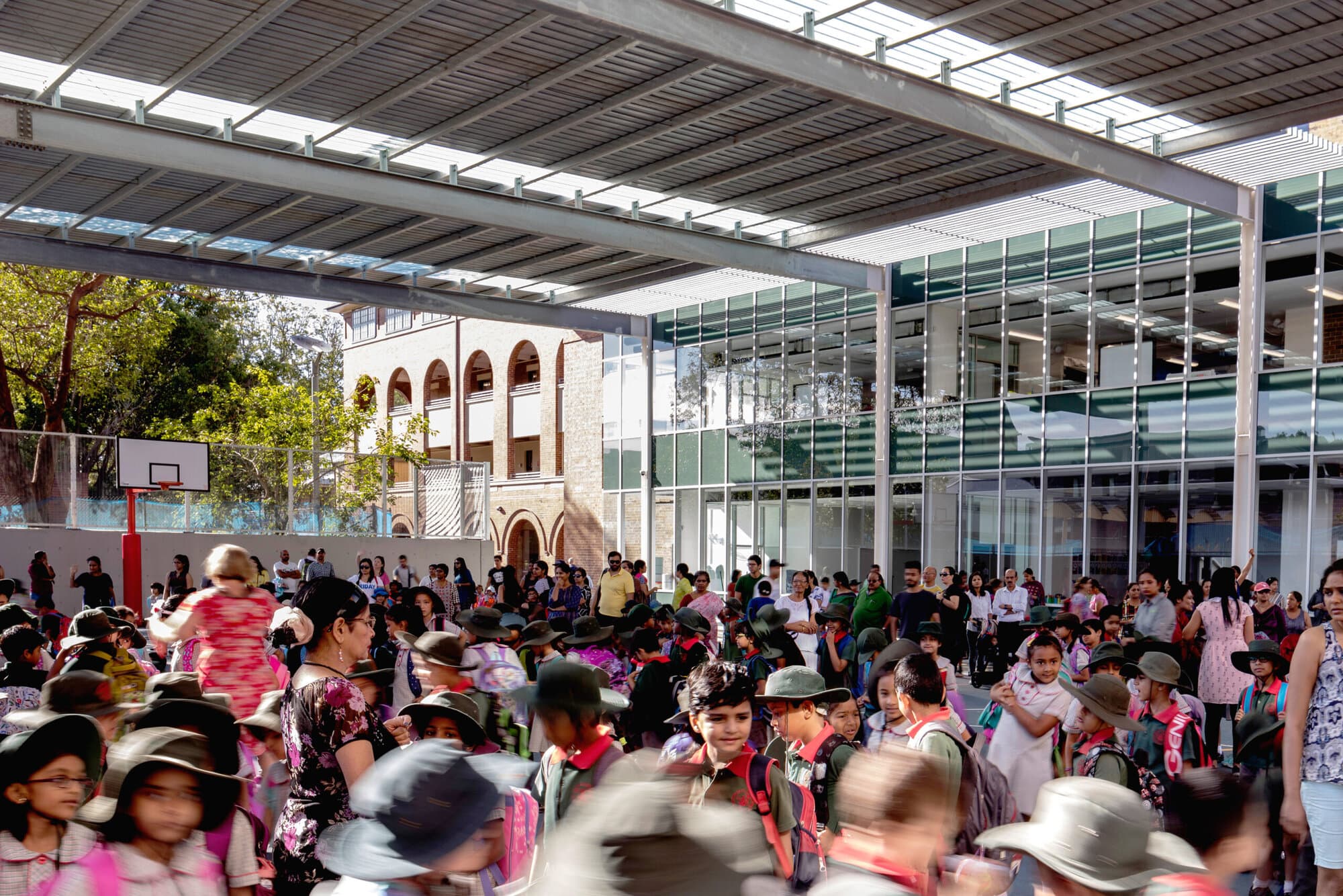 O'Connell Street Public School, sports courts and covered play canopy with heritage building in background