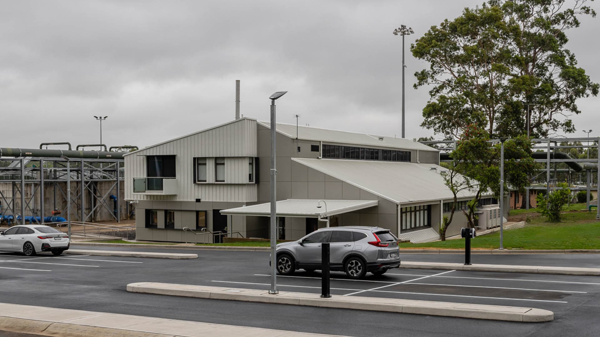 600sqm car park with EV charging station, new landscaping and site access improvements