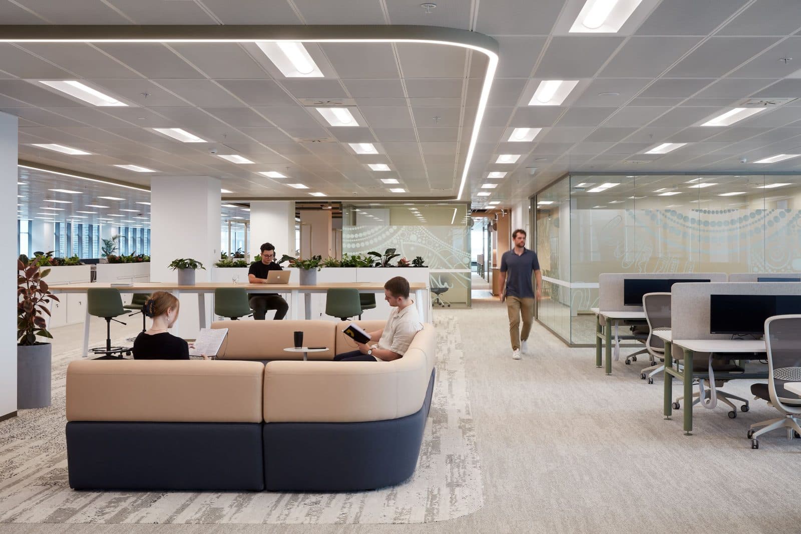 Sydney Water HQ, open plan collaborative workspace with indigenous art on glazed partitions