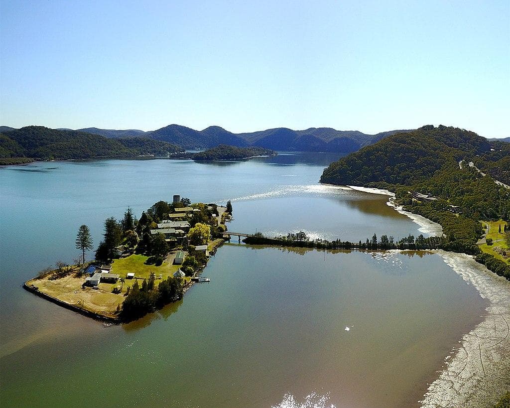 Peat Island, aerial panorama showing heritage buildings, water tower and Hawkesbury River