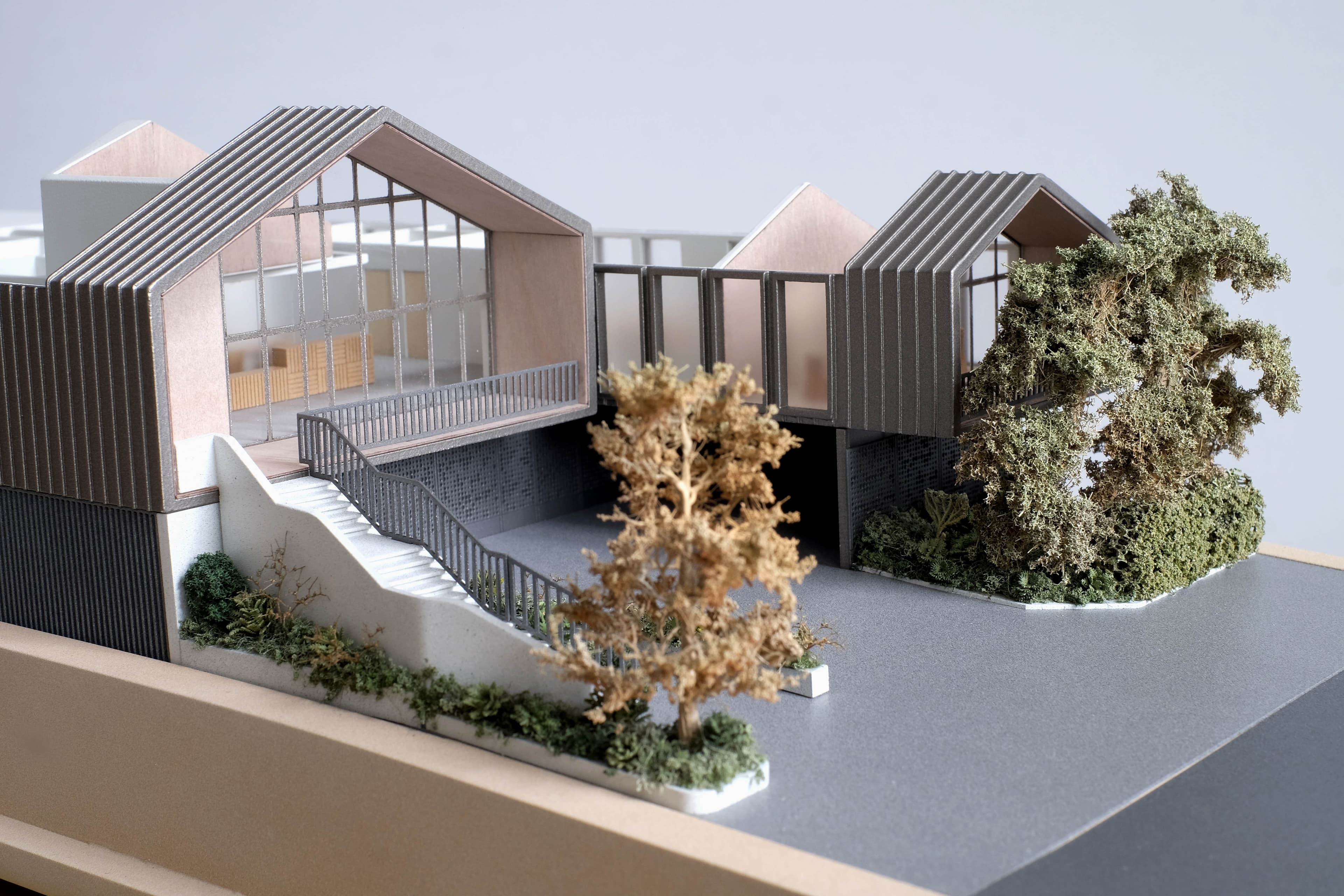 The Shepherd Centre, model detail, gabled entry pavilion with full-height glazing and landscaped arrival