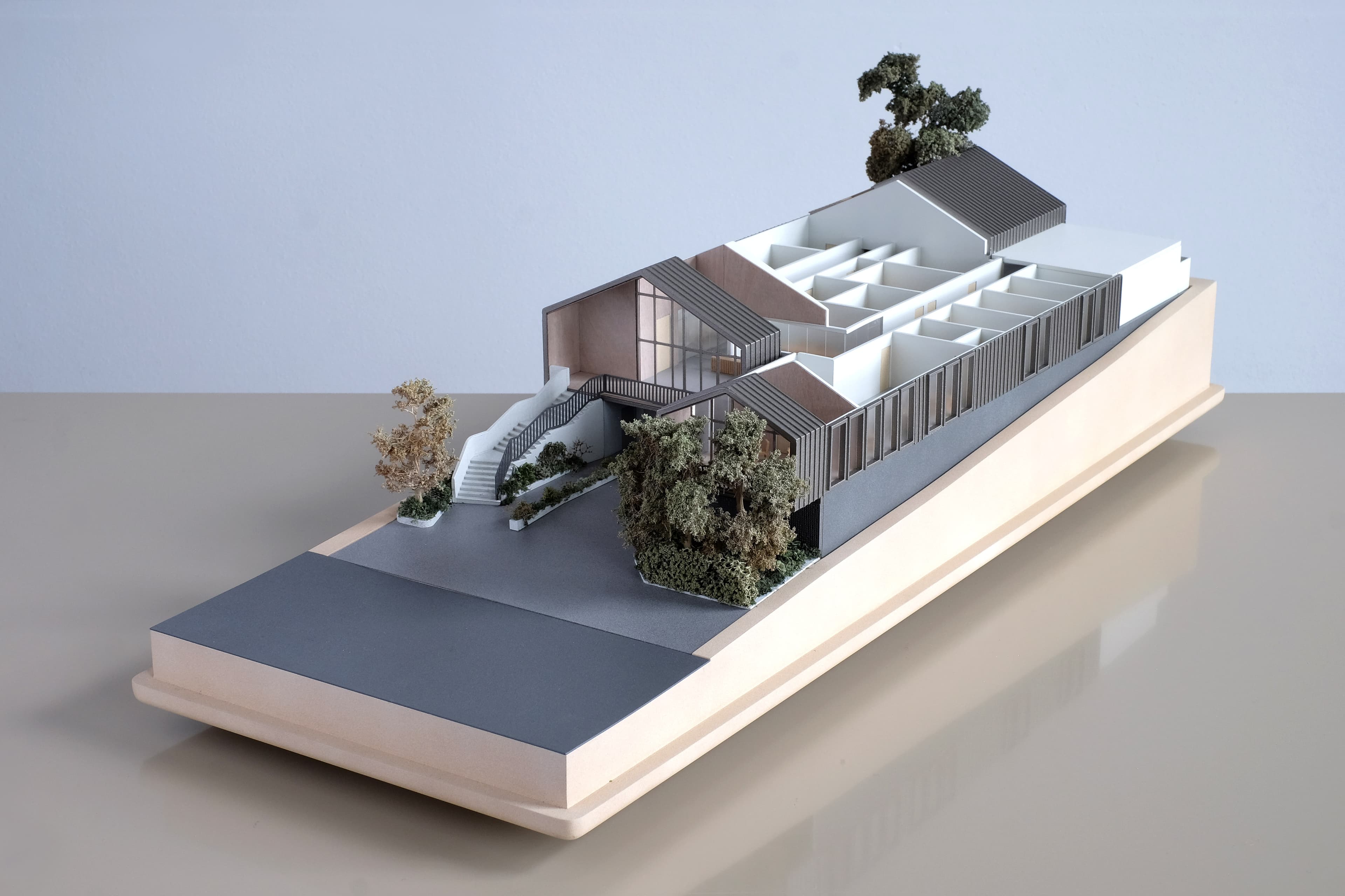 The Shepherd Centre, rear model view showing rooftop terrace, pavilion arrangement and site landscaping